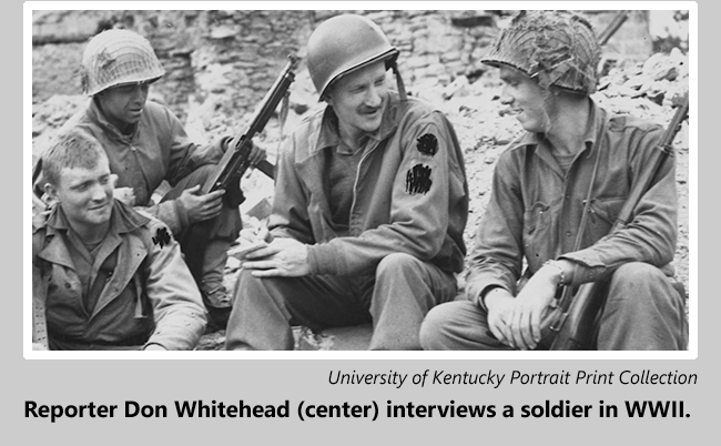 War correspondent Don Whitehead (center) interviews a soldier in WWII.